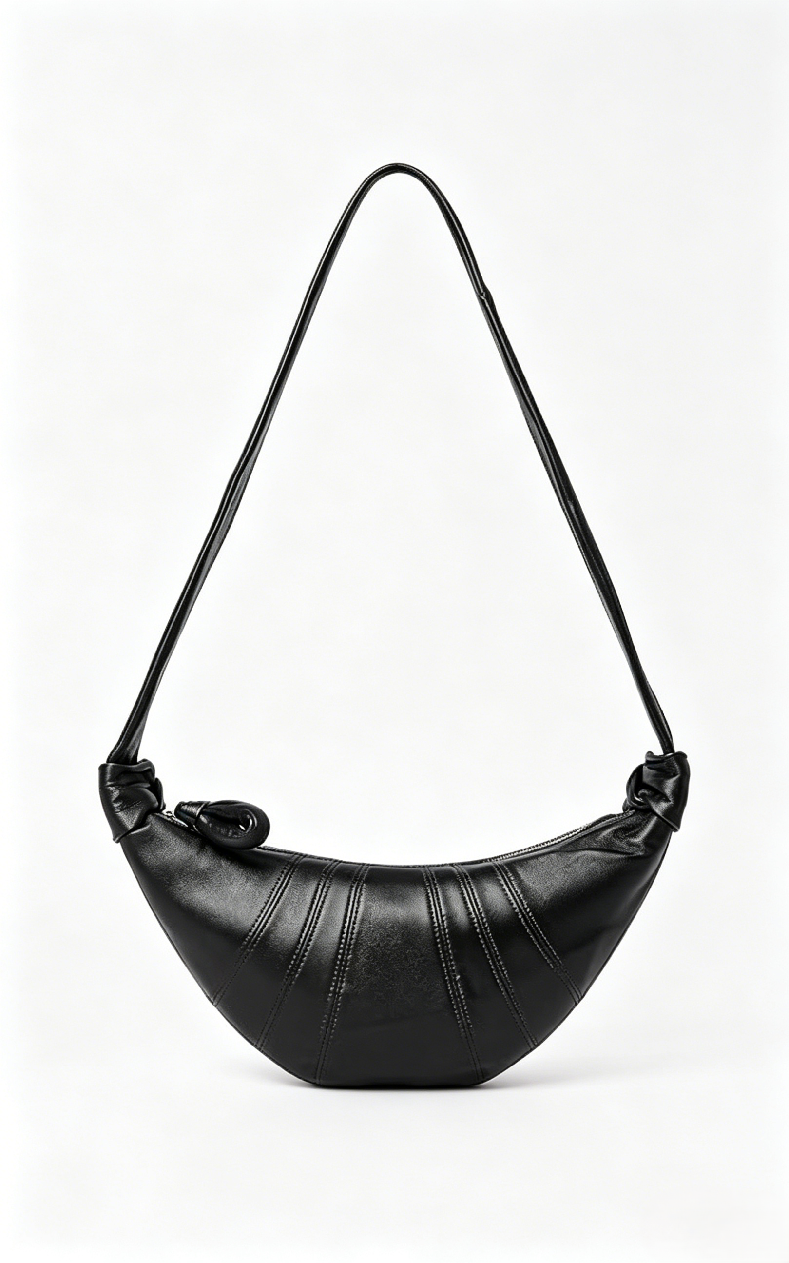 Ladies' soft leather handbag, crescent shaped, with wide shoulder straps.