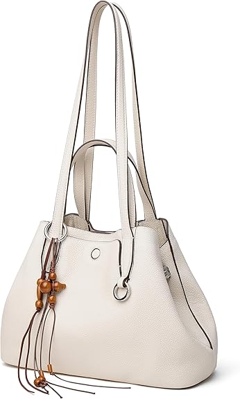 Ladies' genuine leather handbag, equipped with a built-in drawstring pouch and a three-way shoulder strap.