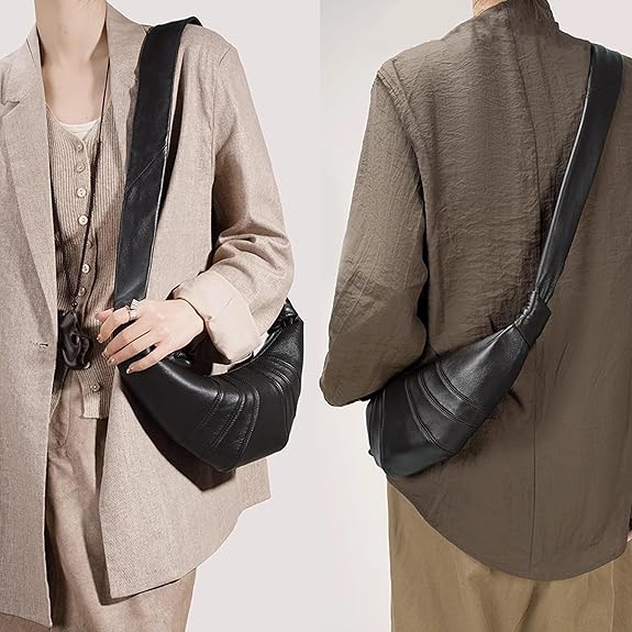 Ladies' soft leather handbag, crescent shaped, with wide shoulder straps.